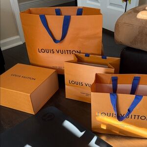 Louis Vuitton Bold Orange Bags with Blue Handles